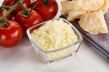 Shredded Italian hard parmesan cheese