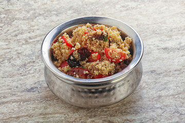Arabic cous cous with meat and tomato