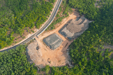 A waste dump organized by humanity on a tropical island in exotic forests. Pollution of relict...