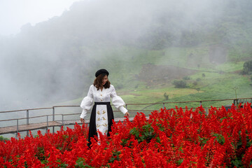 person in a poppy field