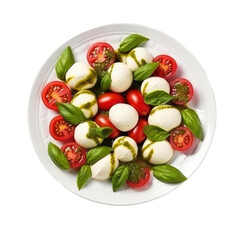 Plate of tasty Caprese salad with mozzarella balls, tomatoes, basil and pesto sauce isolated on a cut out PNG transparent