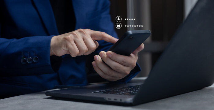 close up businessman use smartphone and type username and password to access private account of office for security system of business technology concept