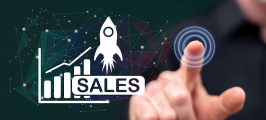 Man touching a sales growth concept