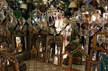 Shop with countless colorful mirrors, table lamps and antiques in all kinds of designs and sizes, with and without decorations in the center of Fez, Morocco