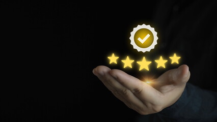 Hand shows the sign of the top service Quality assurance 5 star, Guarantee, Standards, ISO certification and standardization concept