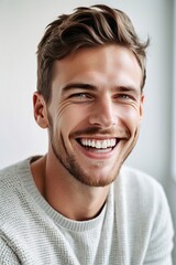 a professional portrait studio photo of a handsome young white american man model with perfect clean teeth laughing and smiling. isolated on white background