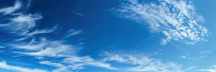 Naklejka na ściany i meble Beautiful blue sky background with clouds. Heaven
