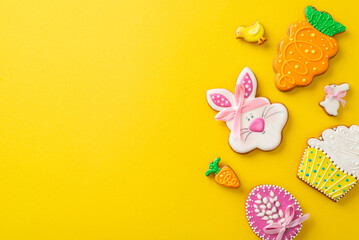 Easter-themed baking concept. Top view photo of a table set of playful themed shaped gingerbreads...