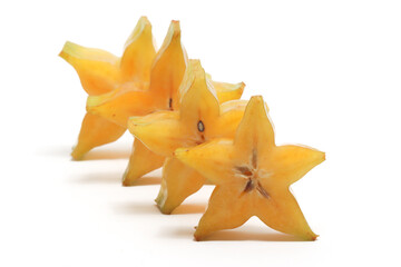 Fototapeta premium Sliced fresh organic star fruit delicious isolated on white background clipping path