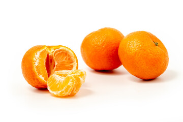 Tangerine or clementine isolated on white background. Ripe mandarin citrus isolated tangerine...