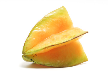 Half cut fresh organic star fruit delicious side view isolated on white background clipping path