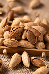 Closeup of almonds，organic badam on table.