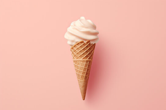 Minimalistic ice cream in a waffle cone on a pink background