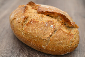 homemade freshly baked bread on a wooden table 8
