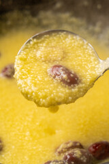 millet congee or millet porridge with jujube in pot
