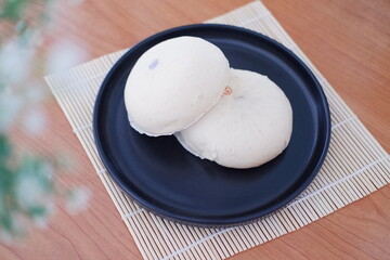 Baozi or Bakpao is a type of yeast-leavened filled bun in various Chinese cuisines. 