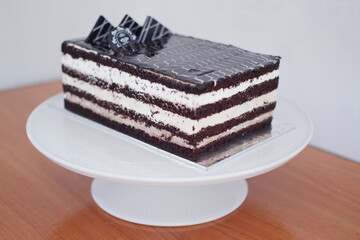 Delicious chocolate cake on a white plate