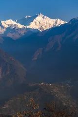 Photo sur Plexiglas Kangchenjunga A view of Snow clad Kangchenjunga, also spelled Kanchenjunga, is the third highest mountain in the world. It lies between Nepal and Sikkim, India,
