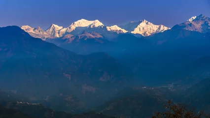 Photo sur Plexiglas Kangchenjunga A view of Snow clad Kangchenjunga, also spelled Kanchenjunga, is the third highest mountain in the world. It lies between Nepal and Sikkim, India,