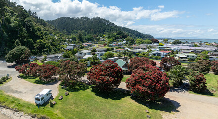 Aerial: Coastline and town of Thames, Coromandel Peninsula, New Zealand.