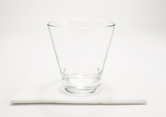 Empty clear glass. White background.