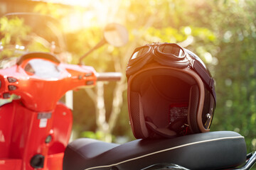 Retro helmet on the back seat of a motorcycle. ready for travel, travel and safety concept.
