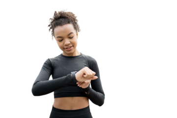 A young female fitness trainer is using a fitness tracker to monitor the progress of her workout. The background is a clear, empty space.