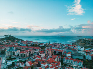 Baiona Bliss: A Breathtaking Aerial View of the Coastal Charm with Dramatic Clouds