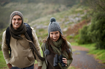 Couple, portrait and hiking on mountain or happy for travel, adventure or holiday for experience or...