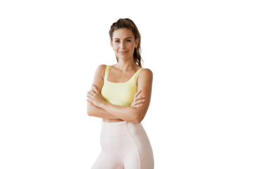 A young portrait of a sporty confident female coach in a tracksuit. Isolated transparent background.