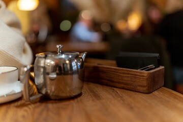 teapot and cup on the table