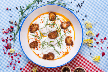 Çılbır, Turkish Poached Eggs. A savory breakfast of poached eggs, served over delicious garlicky yogurt and topped with a warm butter and  pepper flakes.
