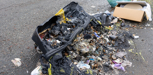 panorama  garbage can after a fire, vandalism