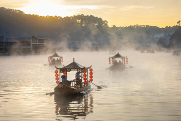 Chinese style tourist boat attraction at Ban Rak Thai village, Mae Hong Son, Thailand during winter...