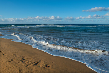 Cyprus Alagadi Turtle Beach.
View from the beach to the sea. Magnificent beach, sea and blue cloudy sky.