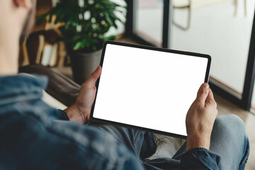 cropped view of man holding digital tablet with blank screen at home - obrazy, fototapety, plakaty