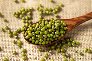 raw mung beans seeds on table.