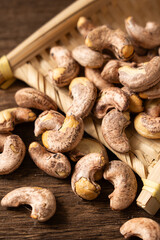 roasted salted cashew nuts on table.