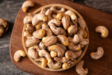 roasted salted cashew nuts on table.