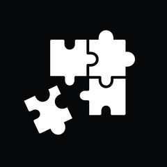 jigsaw puzzle with missing piece on black
