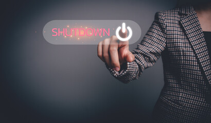Businesswoman hand pressing the shutdown button on the virtual screen. Digital technology, system...