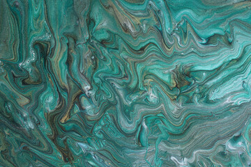 Fototapeta na wymiar art photography of abstract marbleized effect background with turquoise, green, blue and gold creative colors. Beautiful paint.