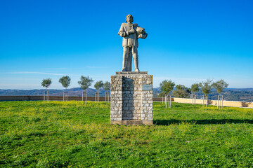 Terreiro de São Tiago with the statue of D.Nunes Alvares Pereira in the center of the lawn next to...