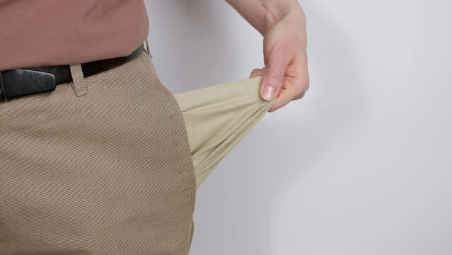 Empty pockets, no money. Concept of poverty, unemployment.