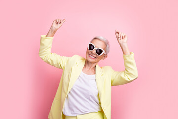 Photo of mature attractive boss business lady in suglasses wear yellow blazer dancing click fingers...