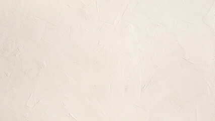 Close-Up View of a Textured White Wall Surface in Daylight