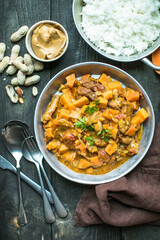 African chicken peanut stew with sweet potatoes  with side of basmati rice
