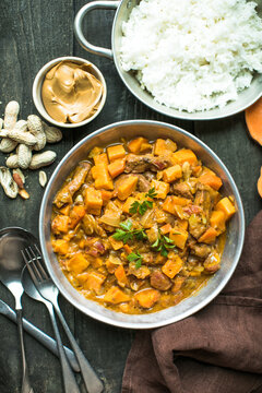 African chicken peanut stew with sweet potatoes  with side of basmati rice