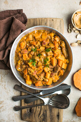 African chicken peanut stew with sweet potatoes  with side of basmati rice