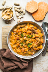 African chicken peanut stew with sweet potatoes  with side of basmati rice